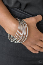 Load image into Gallery viewer, Paparazzi Jewelry &amp; Accessories - Bangle Babe - Silver Bracelet. Bling By Titia Boutique