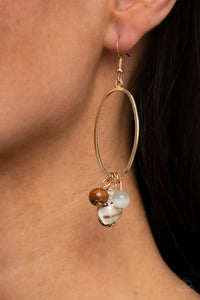 Paparazzi Jewelry & Accessories - Golden Grotto - White Earrings. Bling By Titia Boutique
